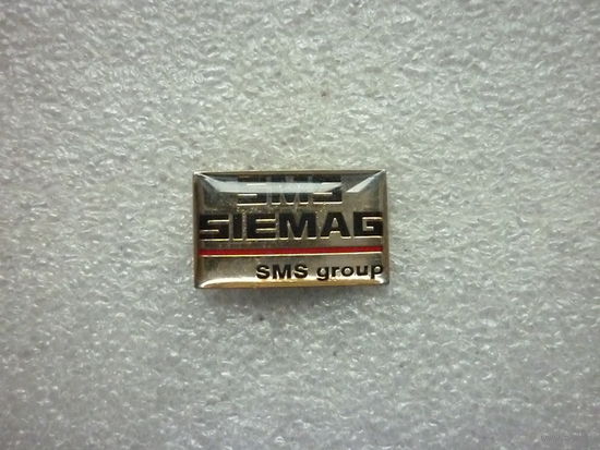 Знак фрачный. SMS SIEMAG. SMS group. Металлургия металлообработка. Нейзильбер цанга.