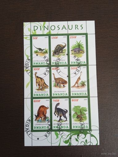 Марки Руанда. Динозавры.