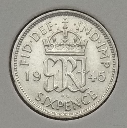 Великобритания 6 пенсов 1945 г. В холдере