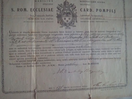 Старинный сертификат на реликвию,выданный Папской Курией в 1928 году.