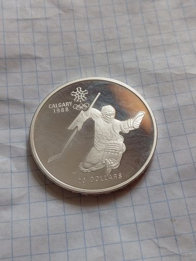 20 долларов 1986 года. Олимпийские игры в Калгари 1988 года. Хоккей. Унция серебра в чистоте металла