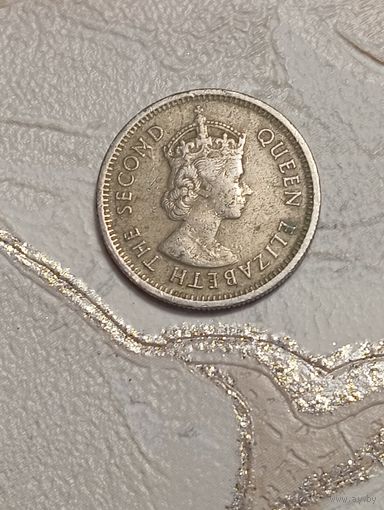 Карибы 10 центов 1965 года .