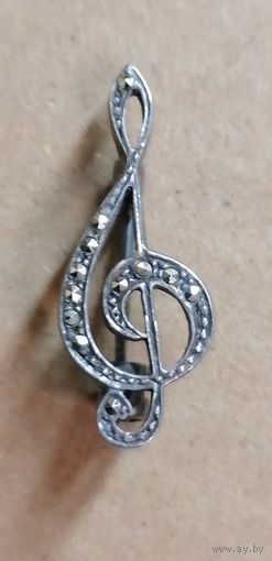 Значок музыкальный символ скрипичный ключ.Клеймо