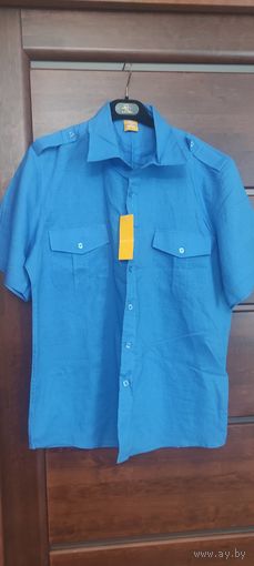 Мужская рубашка ярко синего цвета на 48-50 размер. Интересный натуральный состав: 55 Рами и 45 хлопка. Замеры: ПОгруди 61 см, длина 77 см. Новая.